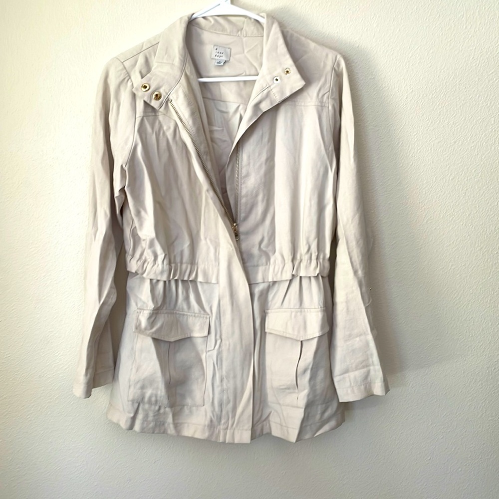 Dressy jacket, light weight, brand new without tags.